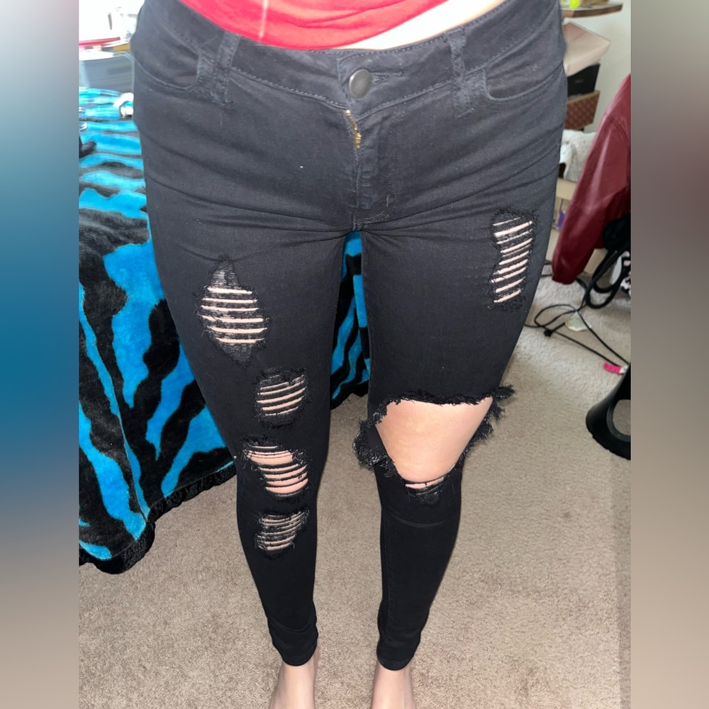 Ripped black skinny jeans